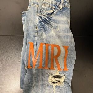 AMIRI Blue Skinny Jeans with Orange Logo